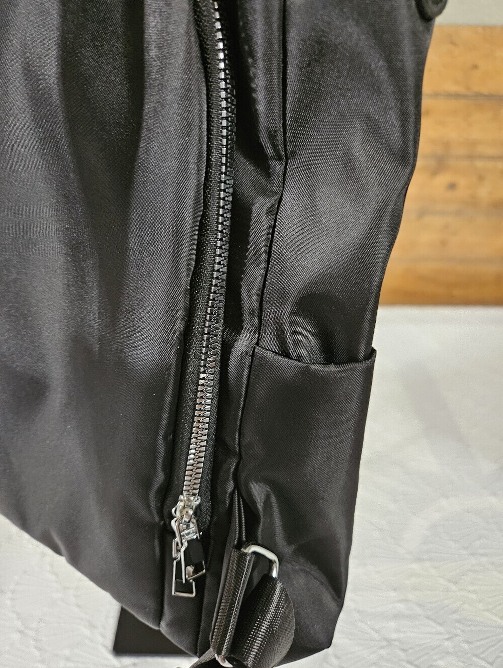 Amazon Women's Black Nylon Anti-theft Backpack with Silver Emblem - Picture 9 of 12